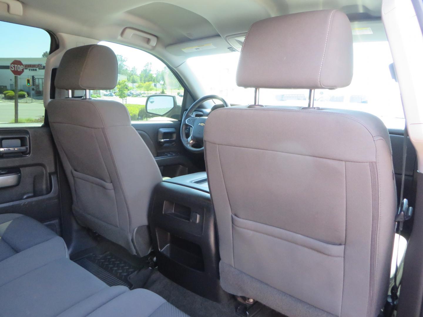 2018 White /BLACK Chevrolet Silverado 1500 LT (3GCPCREC7JG) with an 5.3L V8 OHV 16V engine, automatic transmission, located at 2630 Grass Valley Highway, Auburn, CA, 95603, (530) 508-5100, 38.937893, -121.095482 - Must see Pre Runner.... CST front lift spindals, Camburg UCA's, King Adjustable 2.5 Coil-overs, King 2.5 rear shocks, 35" Toyo RT Trail tires, 17" Method Race wheels, MZ front skid plate, G2 rear differntail cover, Full size bed mounted spare tire, Black Vinyl roof wrap, smoke tail lights and 3rd br - Photo#58